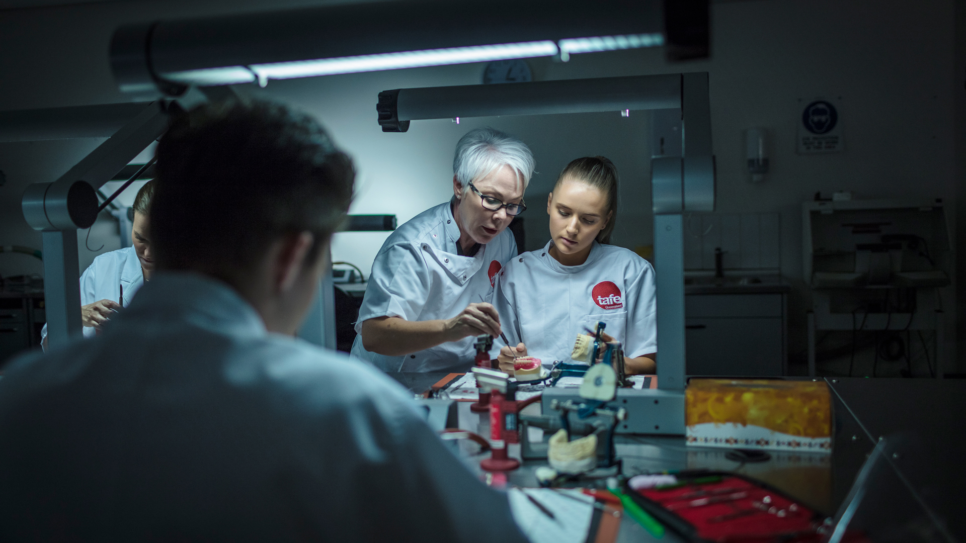 Photograph of TAFE Queensland students learning dentistry