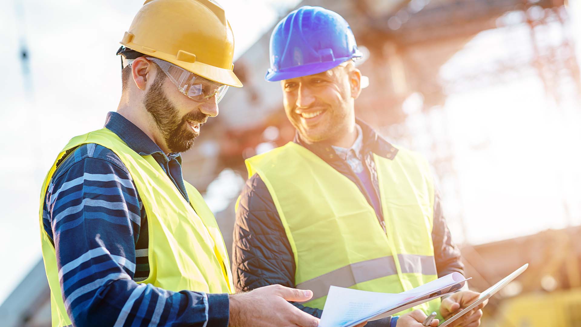 Construction workers reviewing plans 