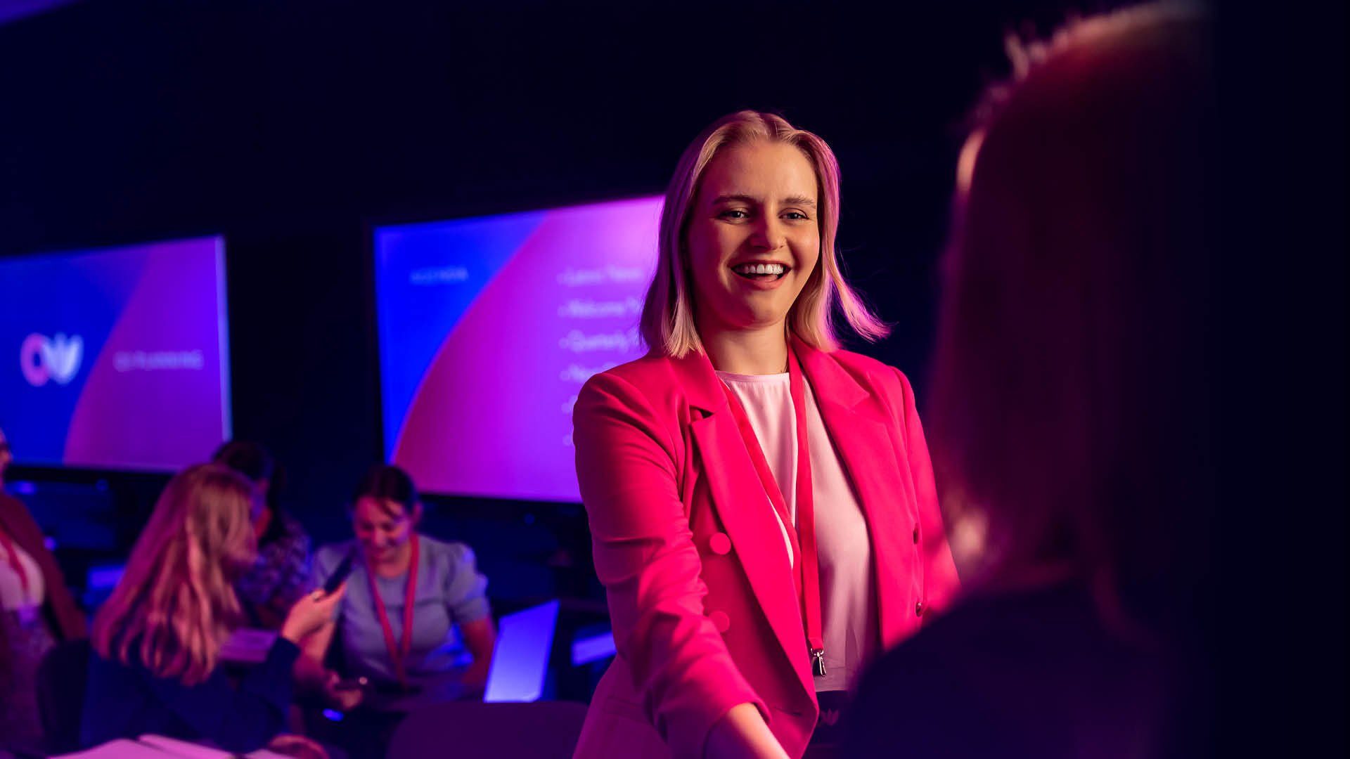 Photograph of a nursing student Zoe Hope working with a hololens heart